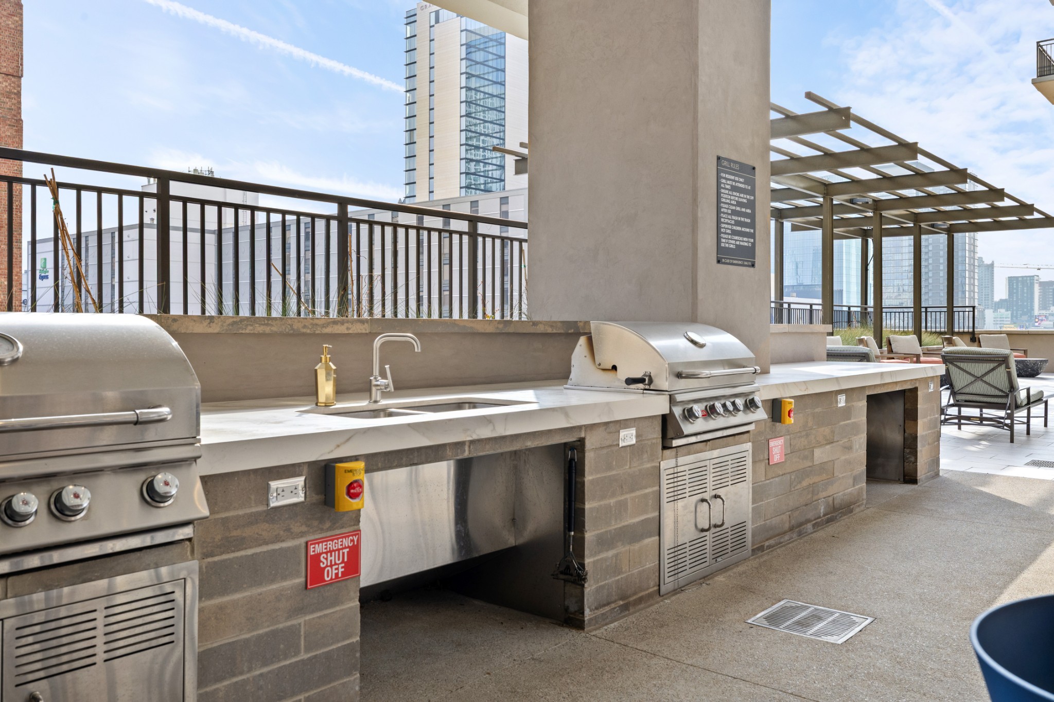 930 Commerce Street, Unit 508 Nashville, TN 37203 - Photo 48 of 65 a utility room with stainless steel appliances a sink and cabinets