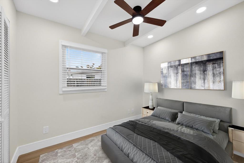 5901 South Coolidge Avenue Tampa, FL 33616 - Photo 26 of 47 a bedroom with a large bed and a window