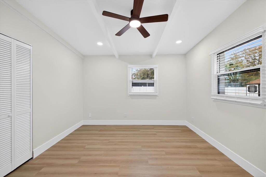 5901 South Coolidge Avenue Tampa, FL 33616 - Photo 28 of 47 a view of empty room with wooden floor and fan
