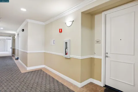 a view of a hallway with closet