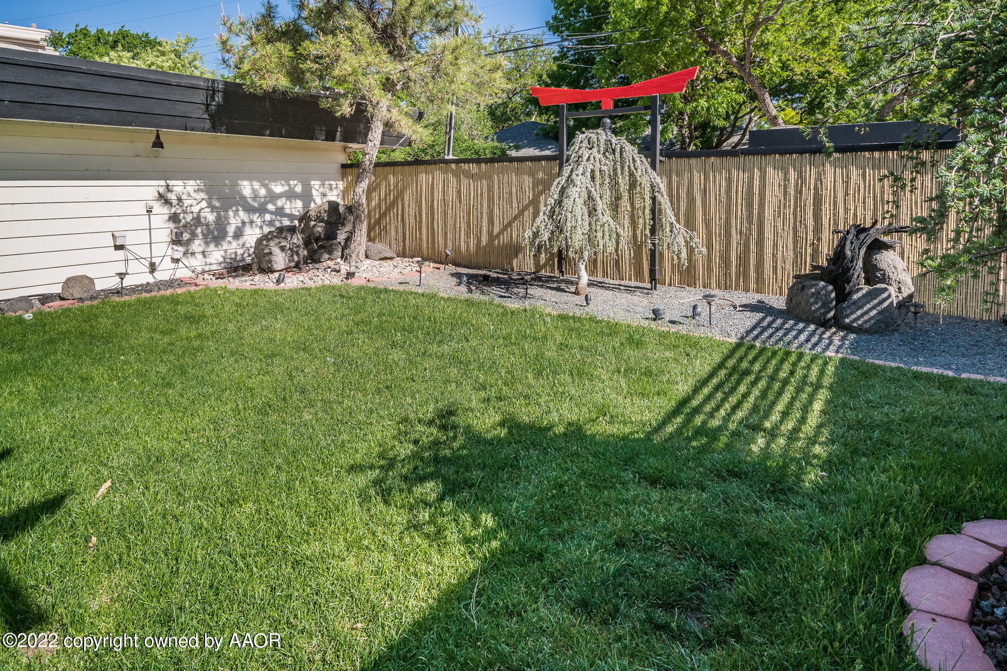 6016 Dreyfuss Road Amarillo, TX 79106 - Photo 81 of 91 a view of a backyard with a garden