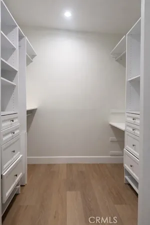a view of an empty walk in closet