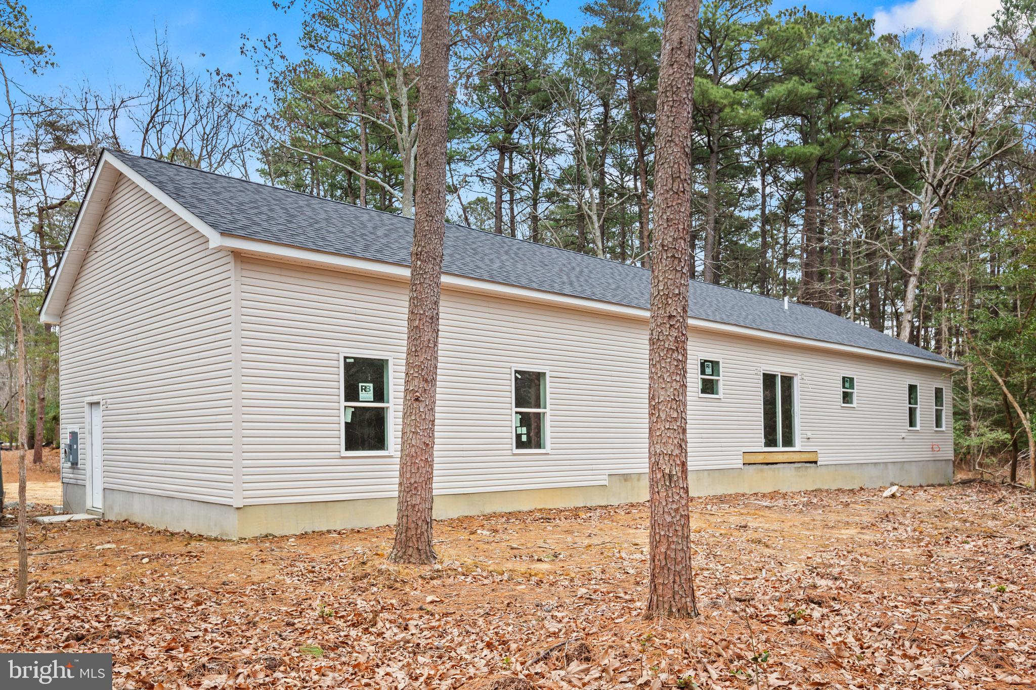 17881 Three Notch Road Lexington Park, MD 20653 - Photo 13 of 17 a view of a house with a yard