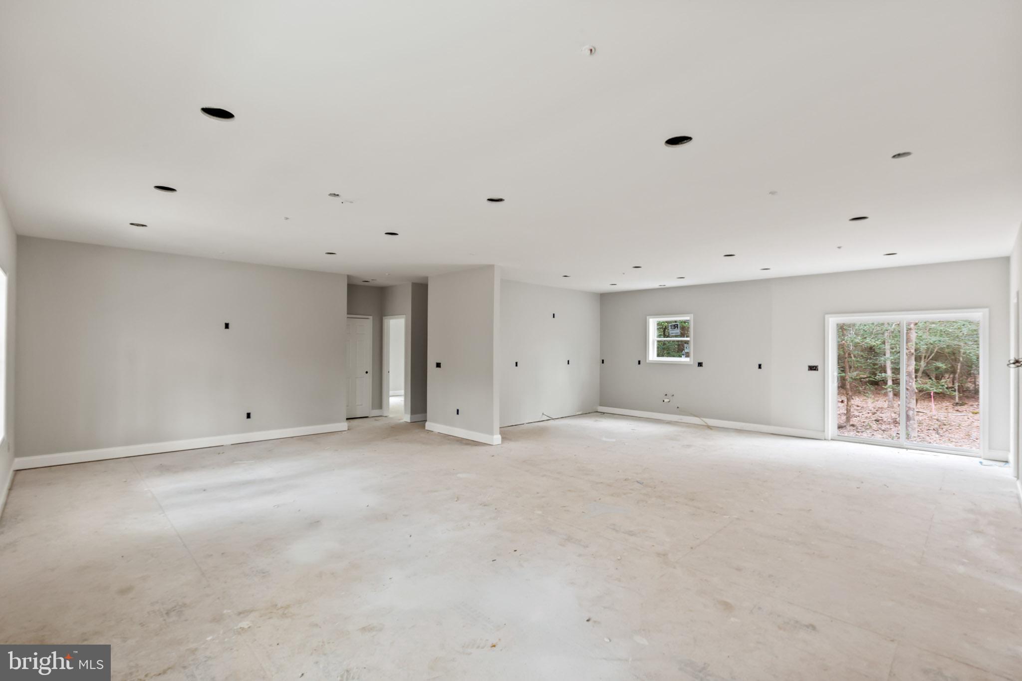 17881 Three Notch Road Lexington Park, MD 20653 - Photo 4 of 17 a view of an empty room with a window