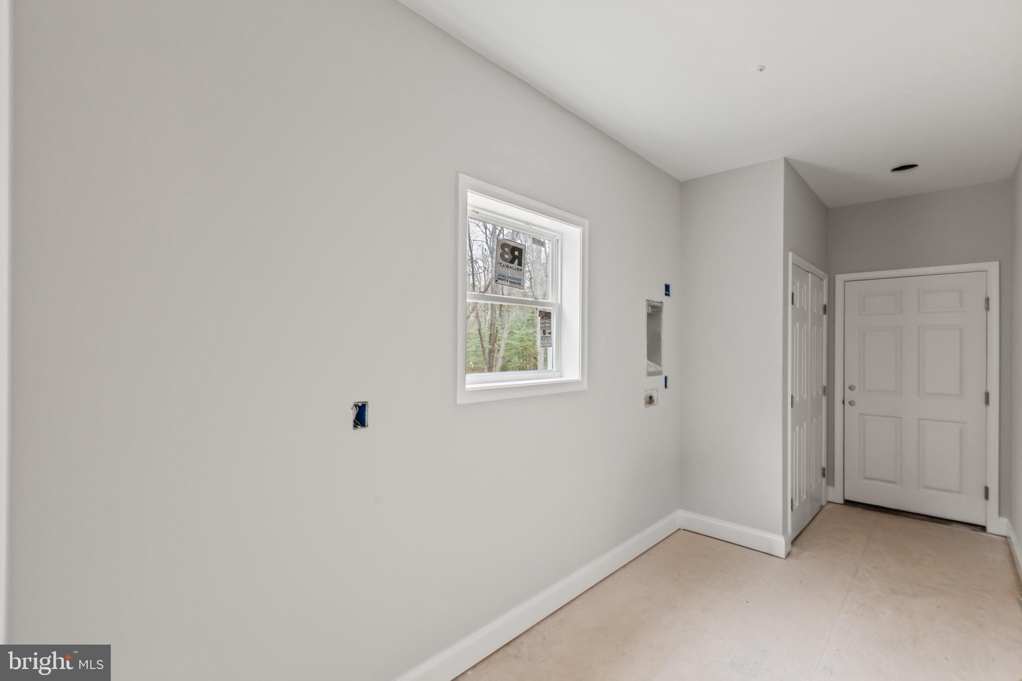 17881 Three Notch Road Lexington Park, MD 20653 - Photo 5 of 17 a view of an empty room with a window