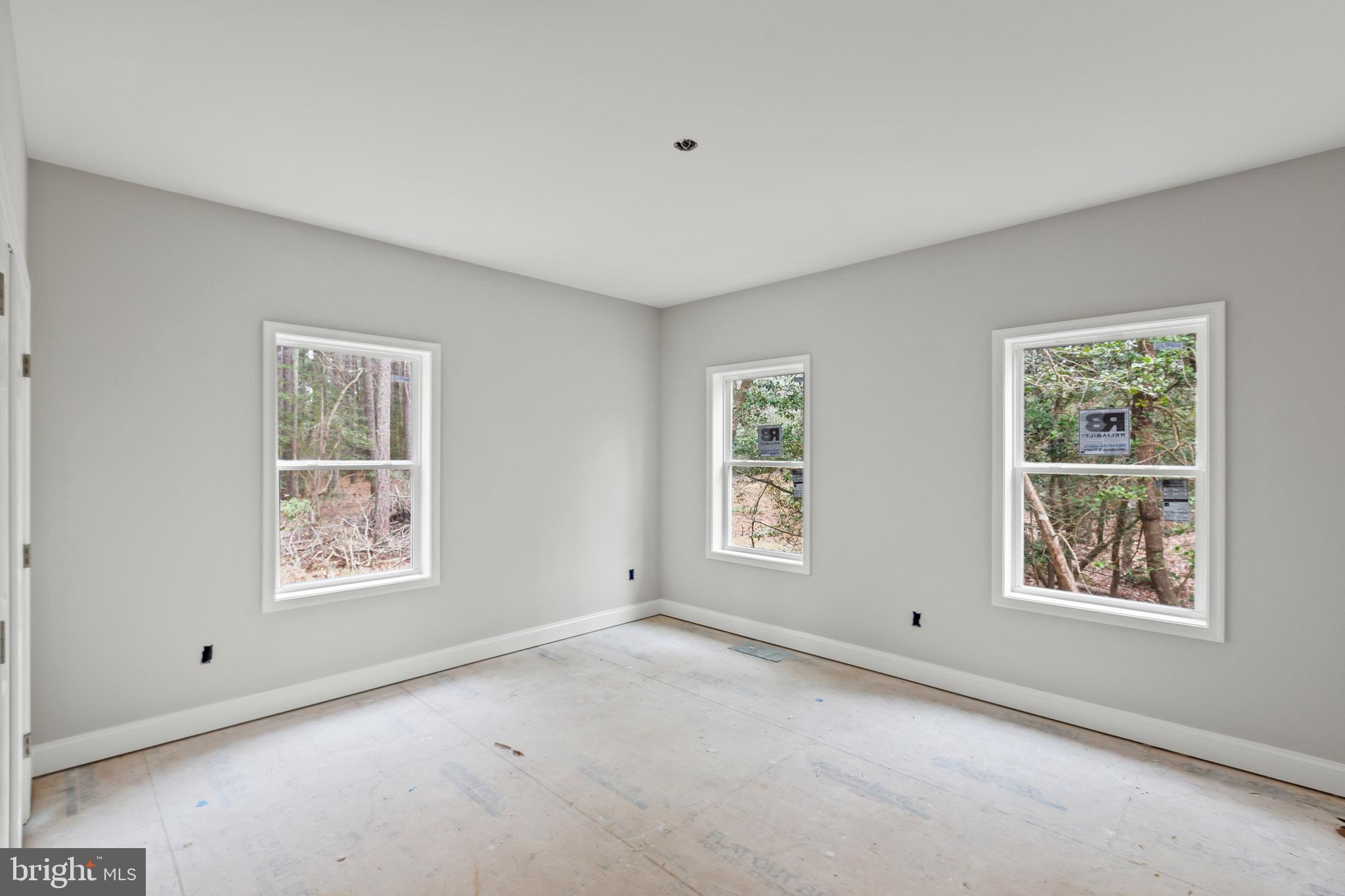 17881 Three Notch Road Lexington Park, MD 20653 - Photo 8 of 17 a view of an empty room with windows