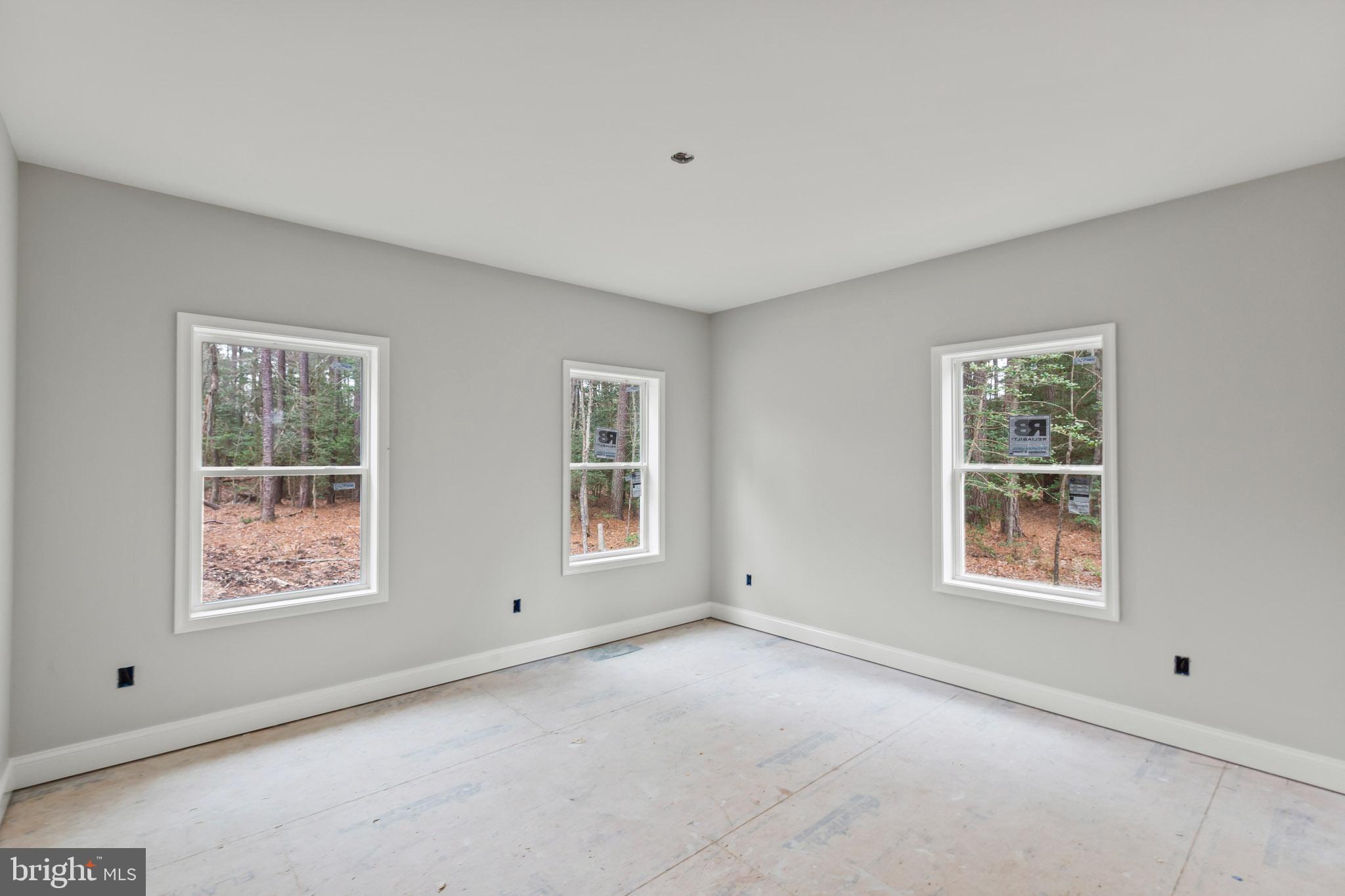 17881 Three Notch Road Lexington Park, MD 20653 - Photo 9 of 17 a view of an empty room with windows