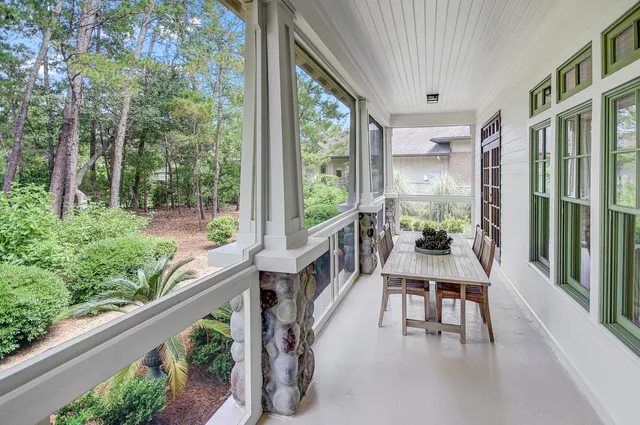 a view of balcony with furniture