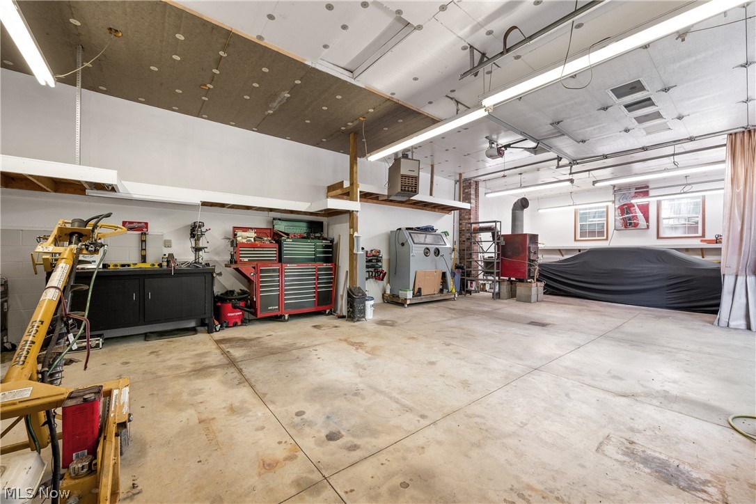 10400 Stoneacre Road Northwest Canal Fulton, OH 44614 - Photo 39 of 44 Garage with a workshop area