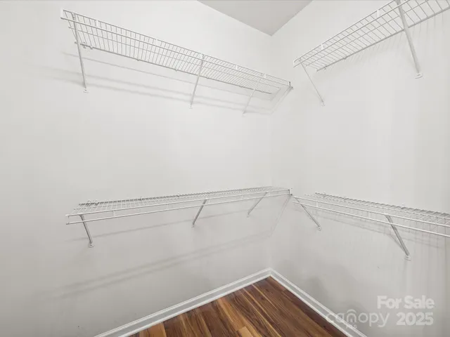 a view of a room with racks on the wall