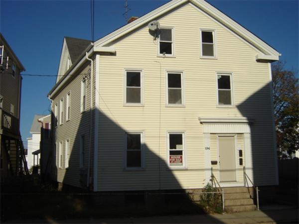 196 Rodman Street Fall River, MA 02721 - Photo 1 of 1 a view of a house with many windows