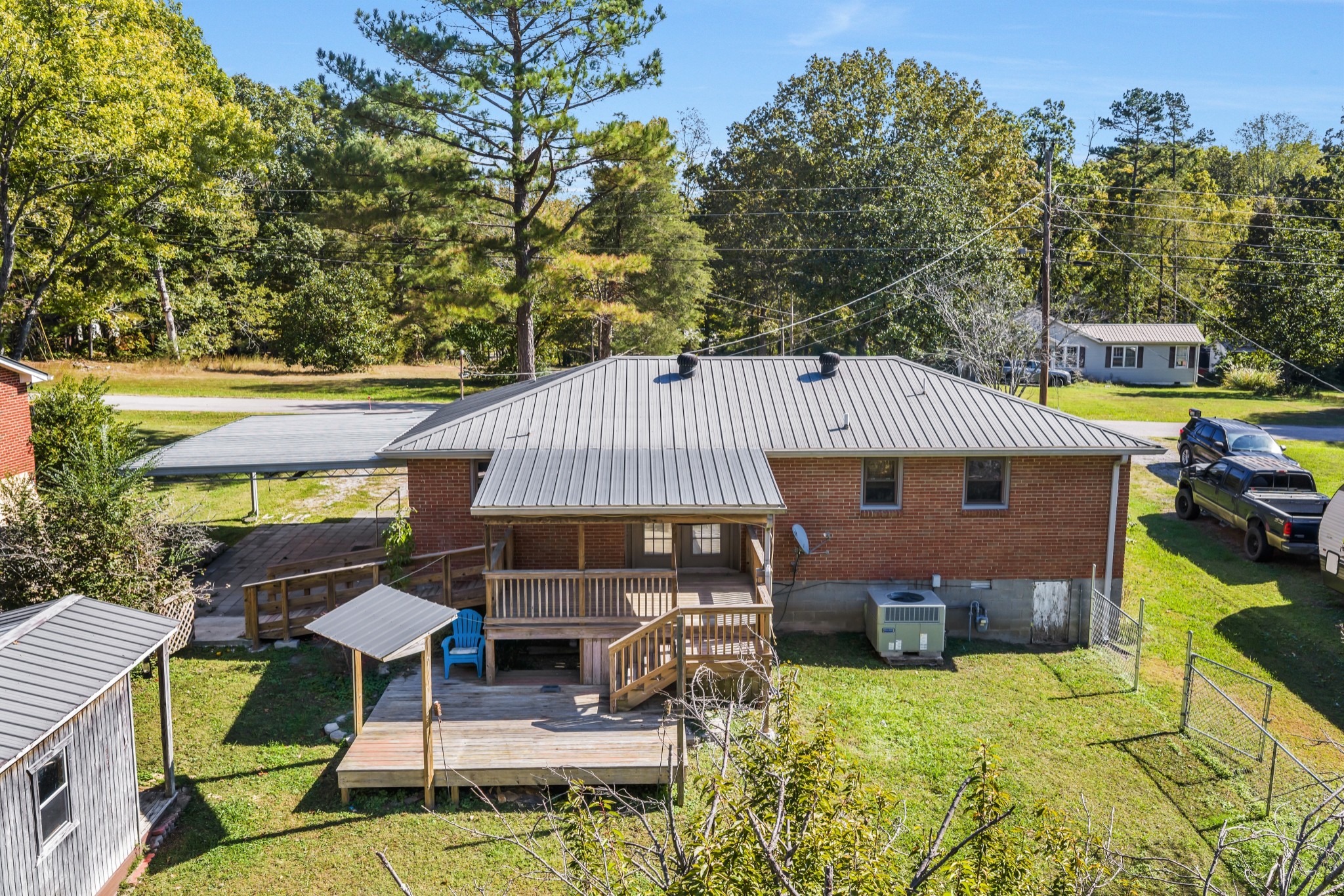 3904 Cedar Street Centerville, TN 37033 - Photo 3 of 18 a front view of house with swimming pool and furniture