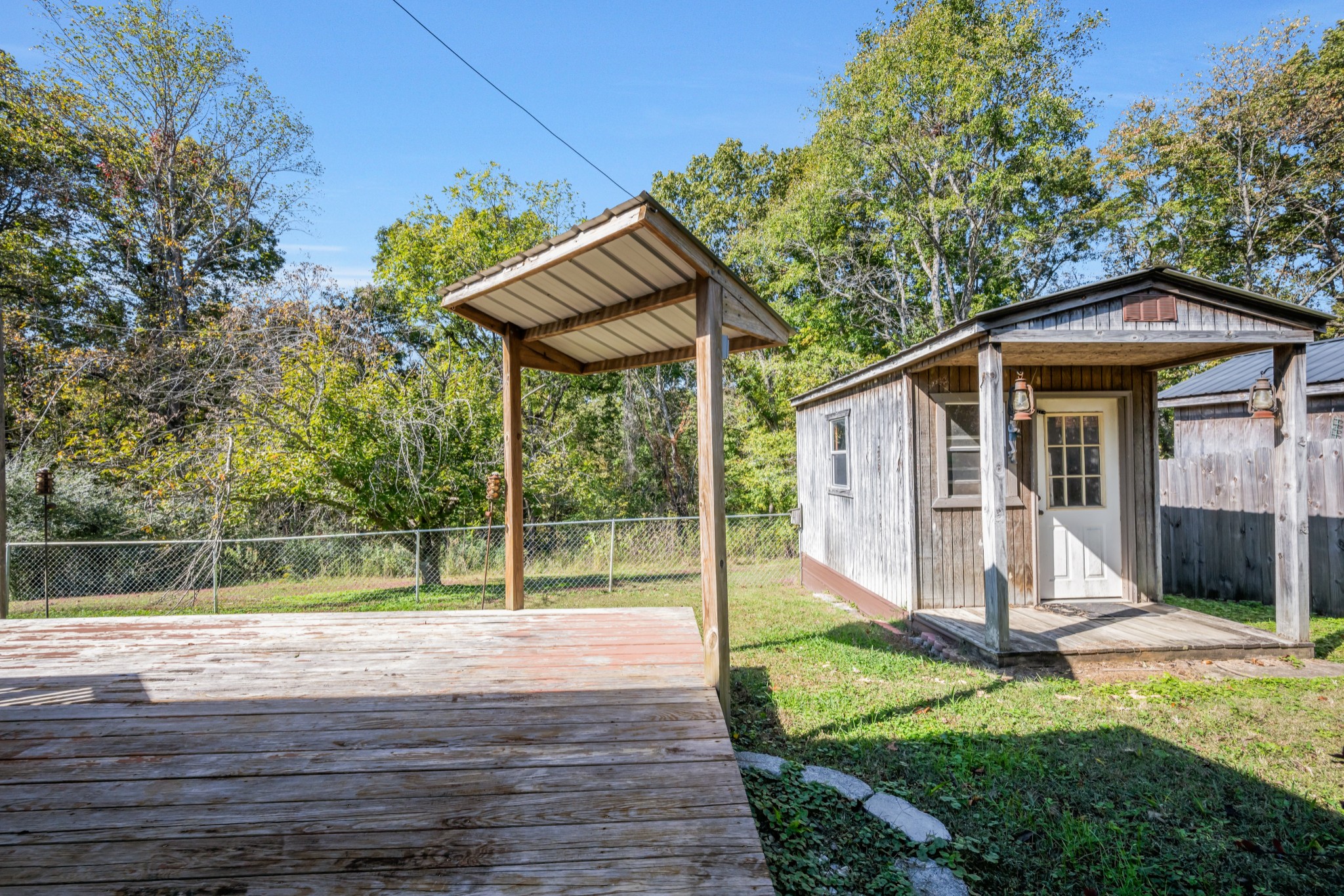 3904 Cedar Street Centerville, TN 37033 - Photo 6 of 18 a view of a house with yard and sitting area