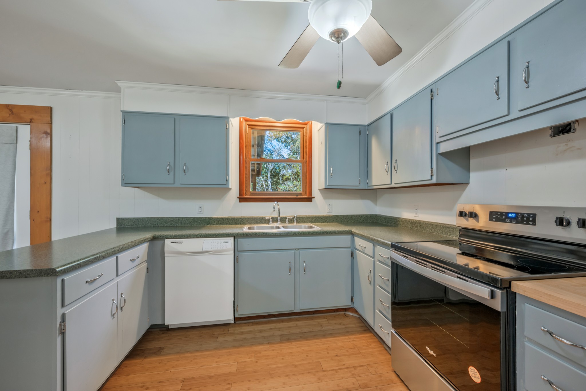 3904 Cedar Street Centerville, TN 37033 - Photo 8 of 18 a kitchen with a sink stove and cabinets