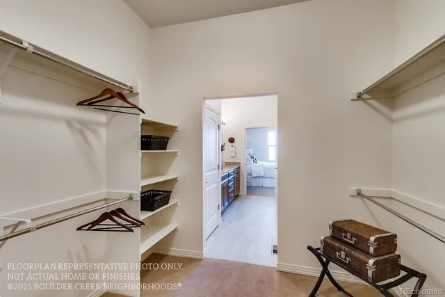 a view of a livingroom with furniture and a flat screen tv