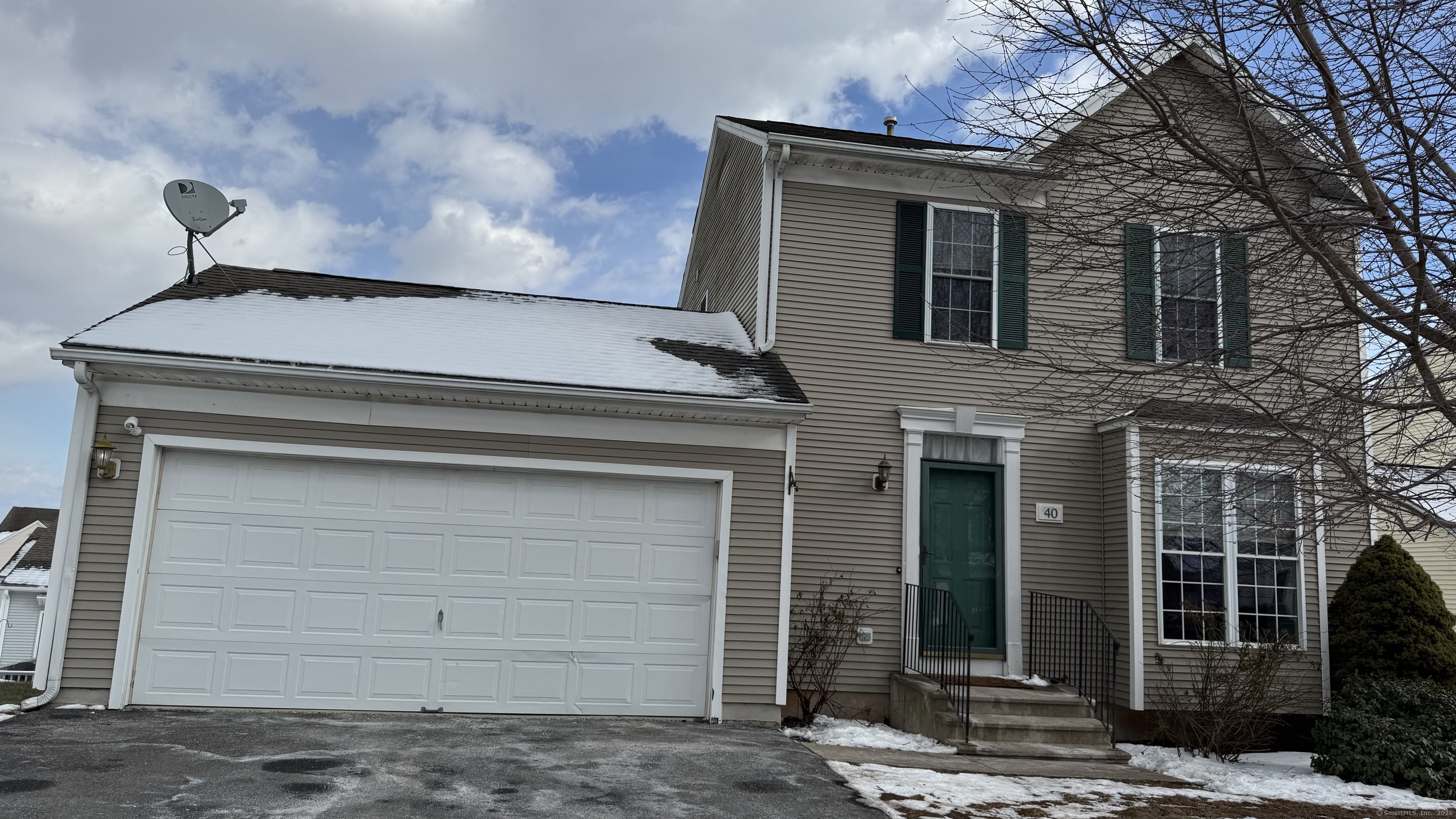 40 Mountain Laurel Way, Unit 40 Suffield, CT 06078 - Photo 1 of 16 a view of a house with a large windows