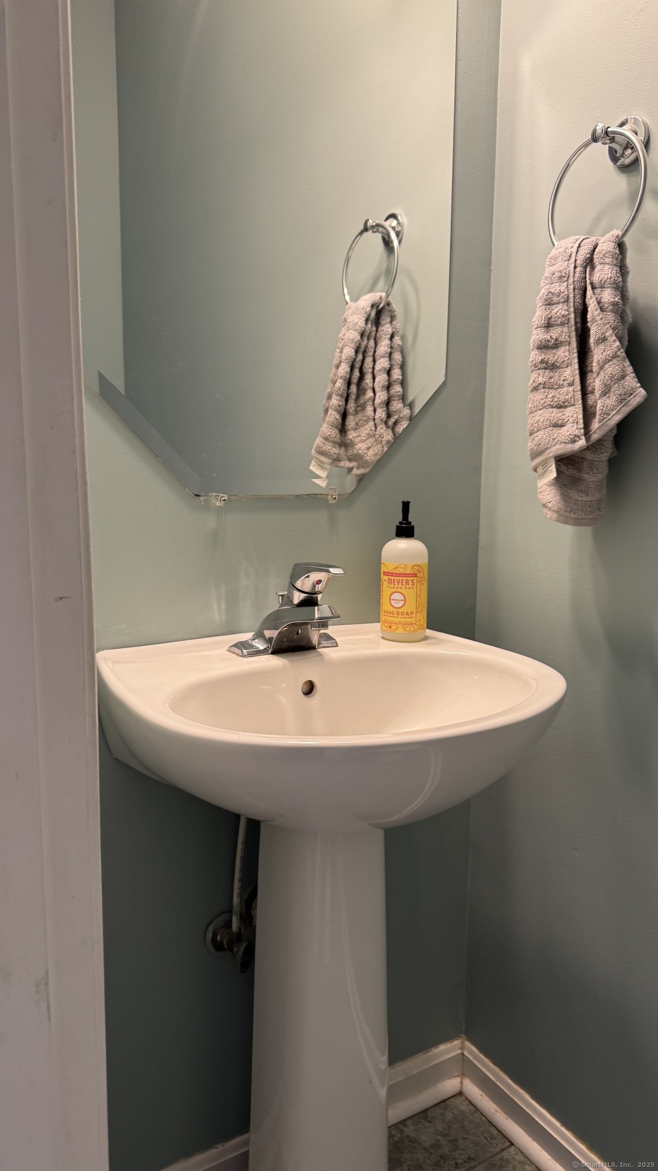 40 Mountain Laurel Way, Unit 40 Suffield, CT 06078 - Photo 7 of 16 a bathroom with a sink a mirror and vanity