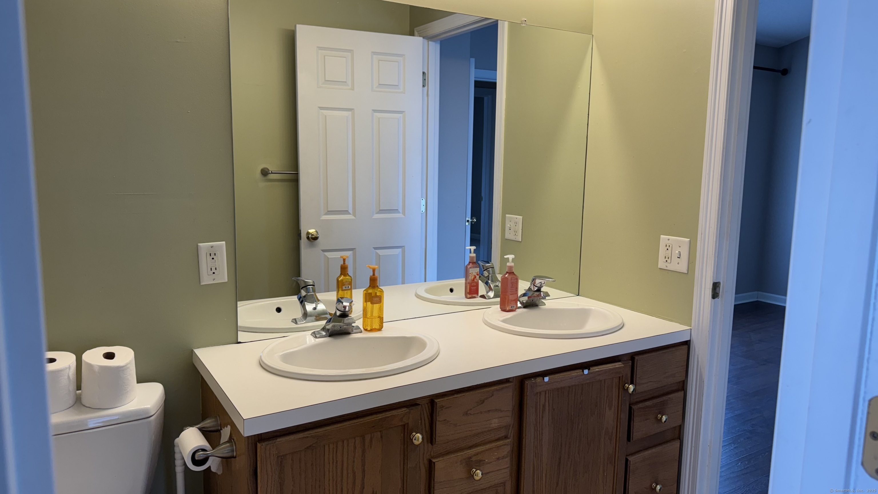40 Mountain Laurel Way, Unit 40 Suffield, CT 06078 - Photo 9 of 16 a bathroom with a sink and a mirror