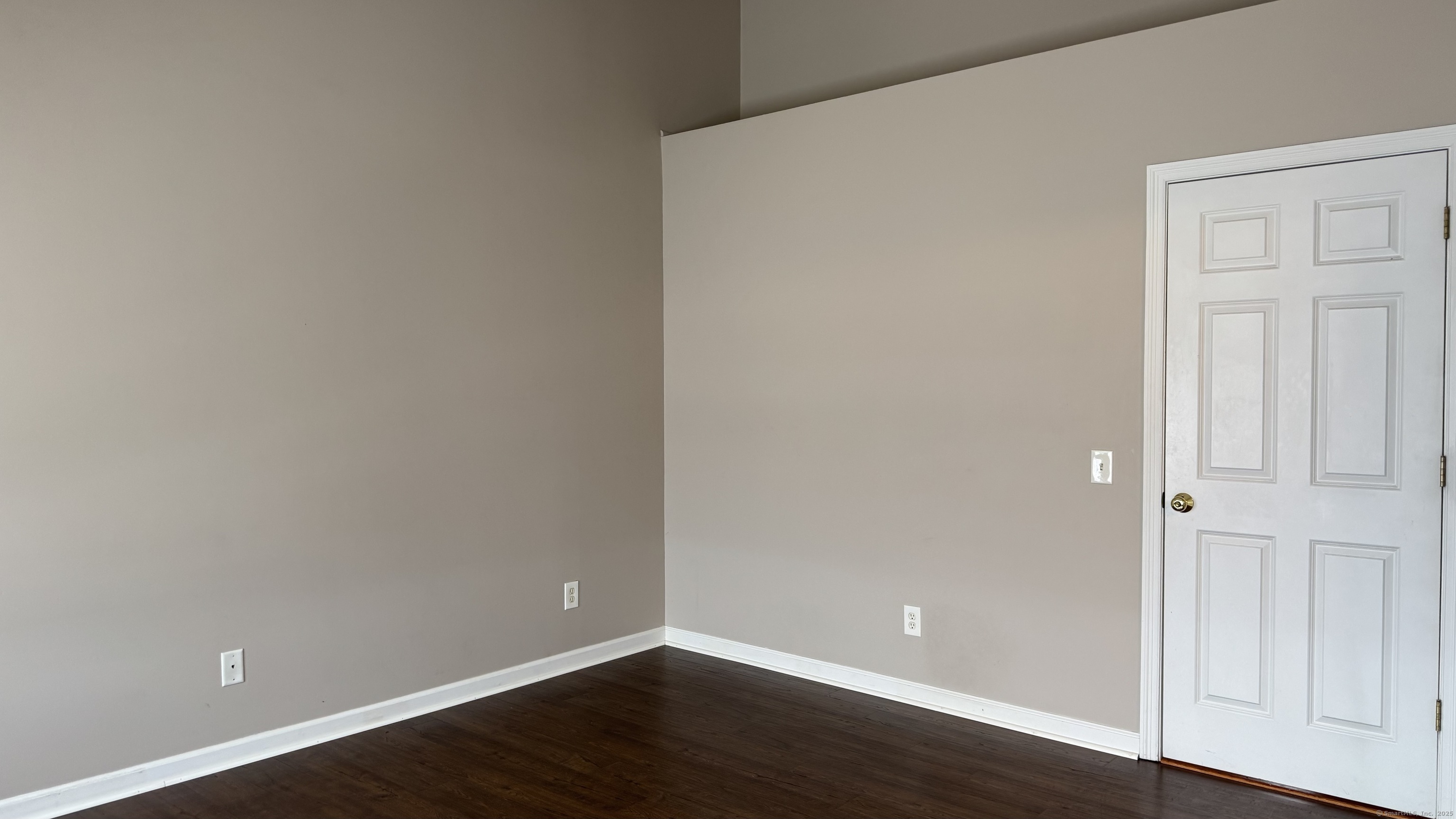40 Mountain Laurel Way, Unit 40 Suffield, CT 06078 - Photo 10 of 16 a view of an empty room with wooden floor