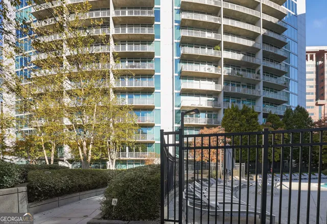 a view of a building with a tree