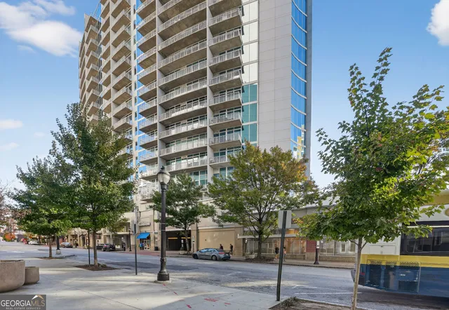 a view of a building and a street