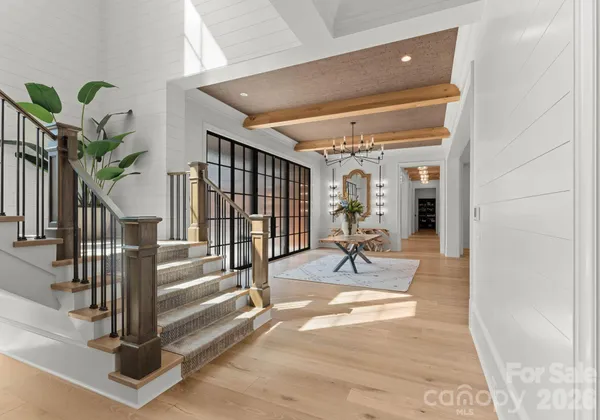 a view of entryway livingroom and hall