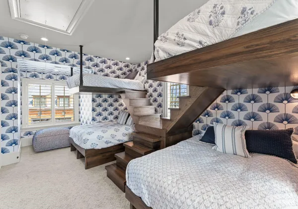 a living room with furniture and flowers