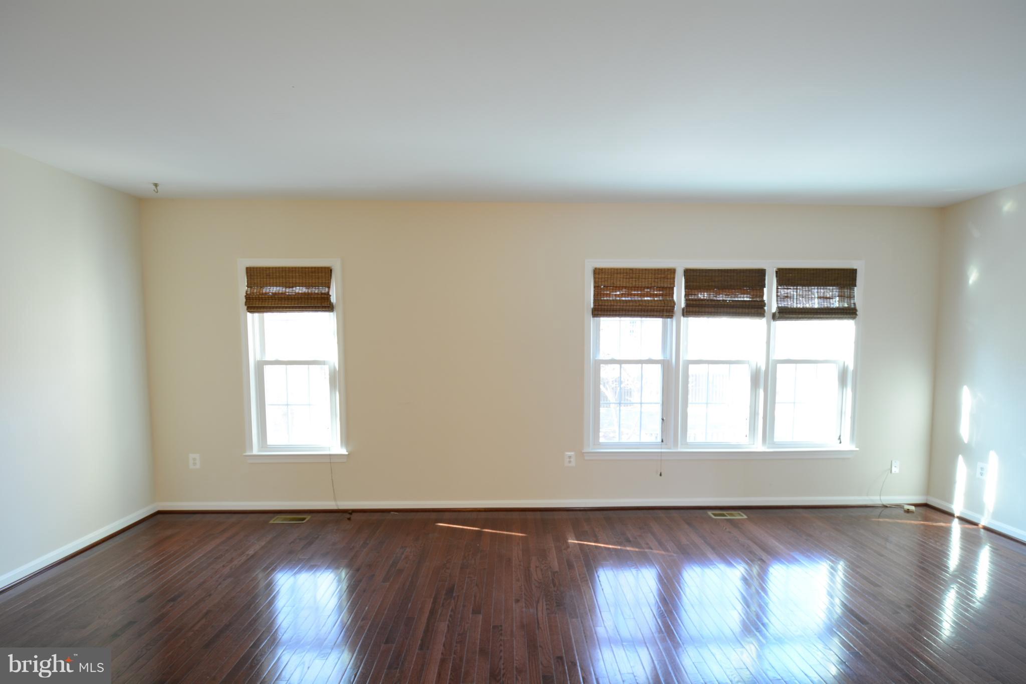 8985 Omega Court Springfield, VA 22152 - Photo 2 of 25 Step Down Living Room