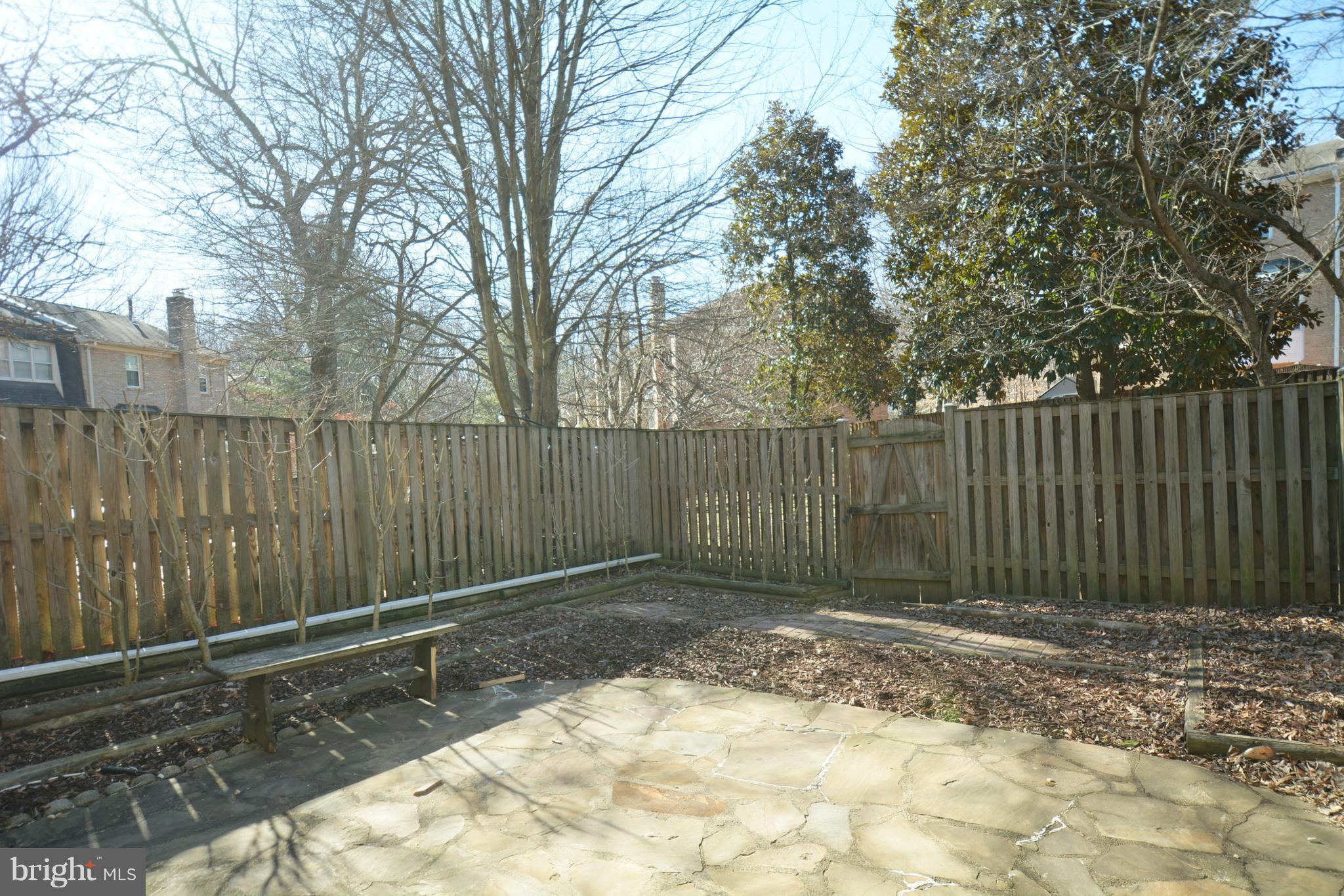 8985 Omega Court Springfield, VA 22152 - Photo 18 of 25 Stone Patio with Garden Beds