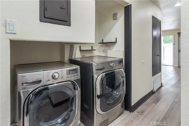 a kitchen with stainless steel appliances granite countertop a sink and a cabinets