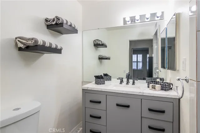 a view of walk in closet with cabinet