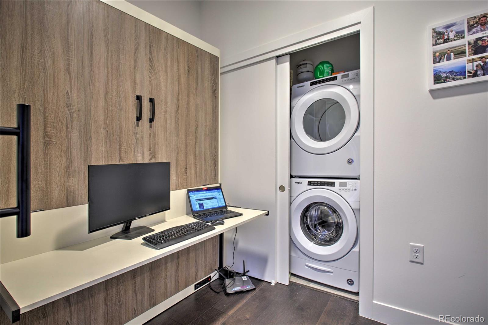 2550 Lawrence Street, Unit RB204 Denver, CO 80205 - Photo 23 of 36 a view of a workspace with furniture and a window