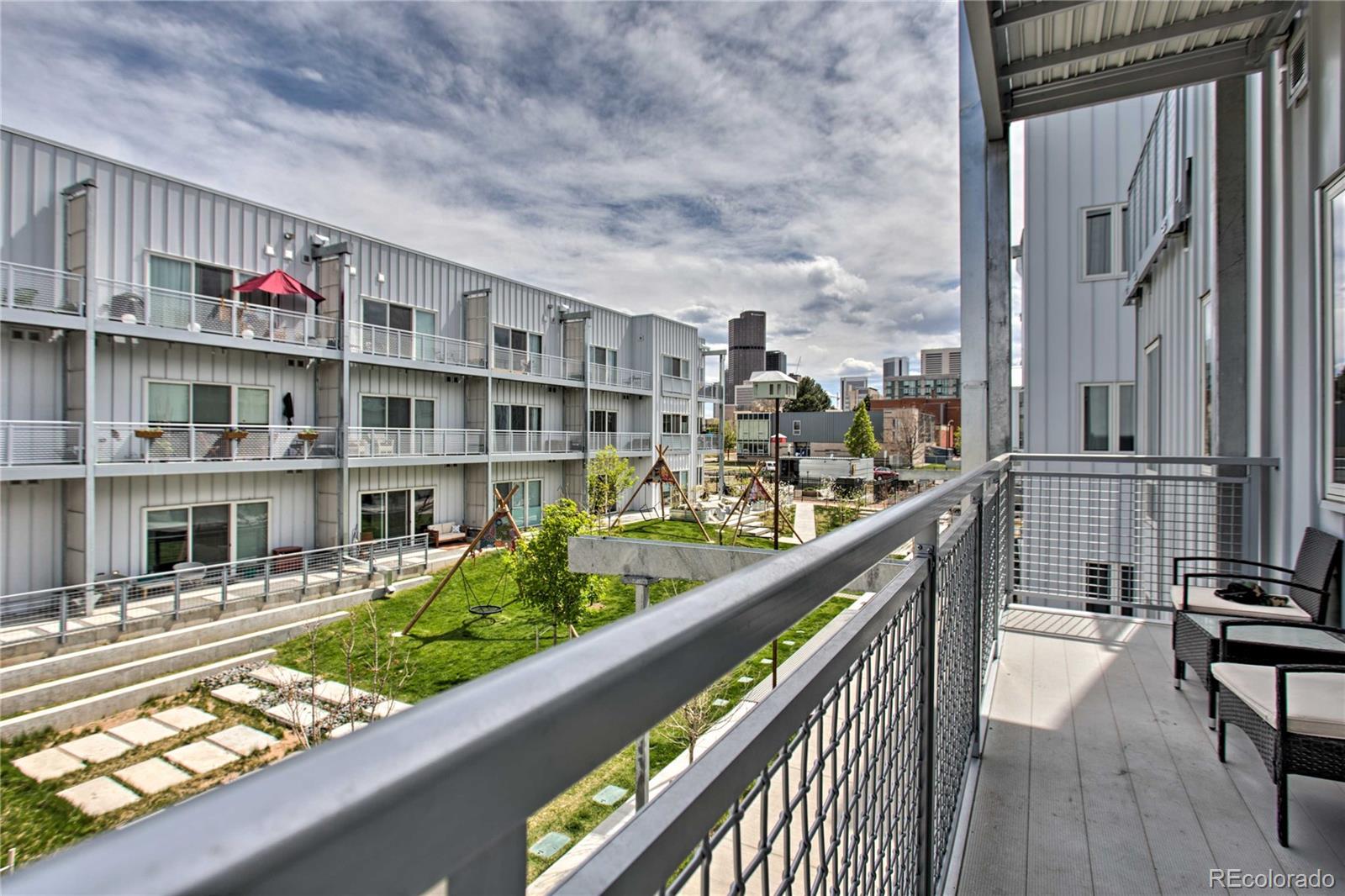 2550 Lawrence Street, Unit RB204 Denver, CO 80205 - Photo 28 of 36 a view of balcony with furniture