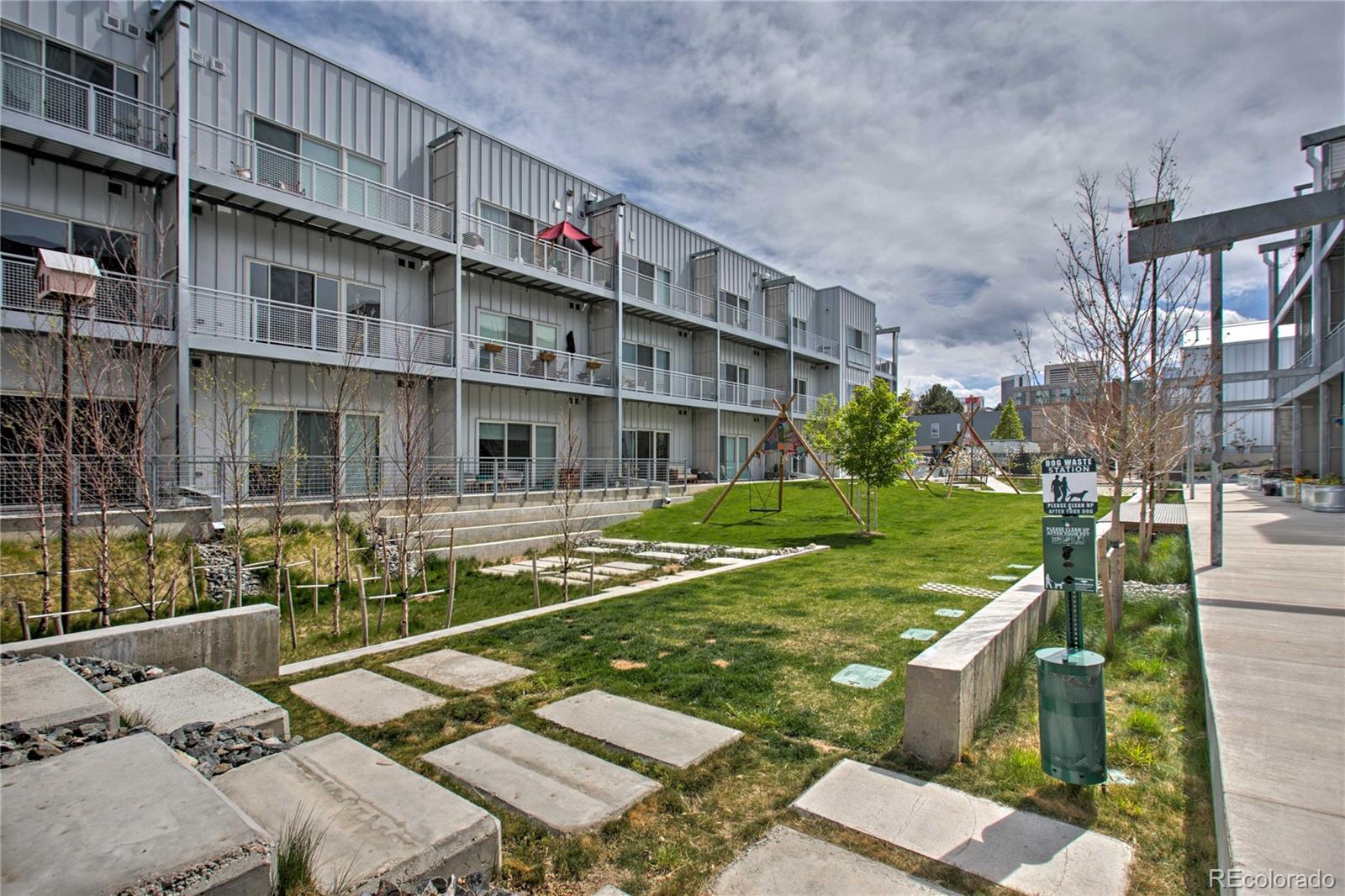 2550 Lawrence Street, Unit RB204 Denver, CO 80205 - Photo 31 of 36 a aerial view of a house with swimming pool