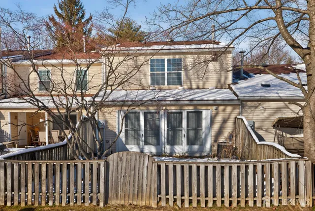 a view of a house with a small yard