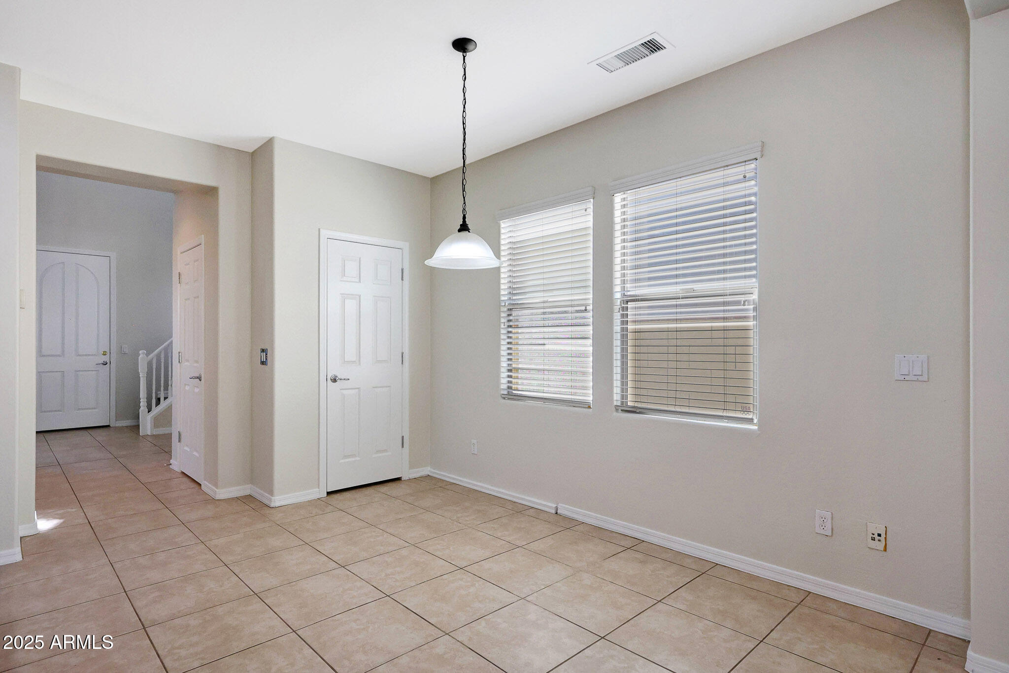 20822 West Ridge Road Buckeye, AZ 85396 - Photo 16 of 46 a view of an empty room with a window