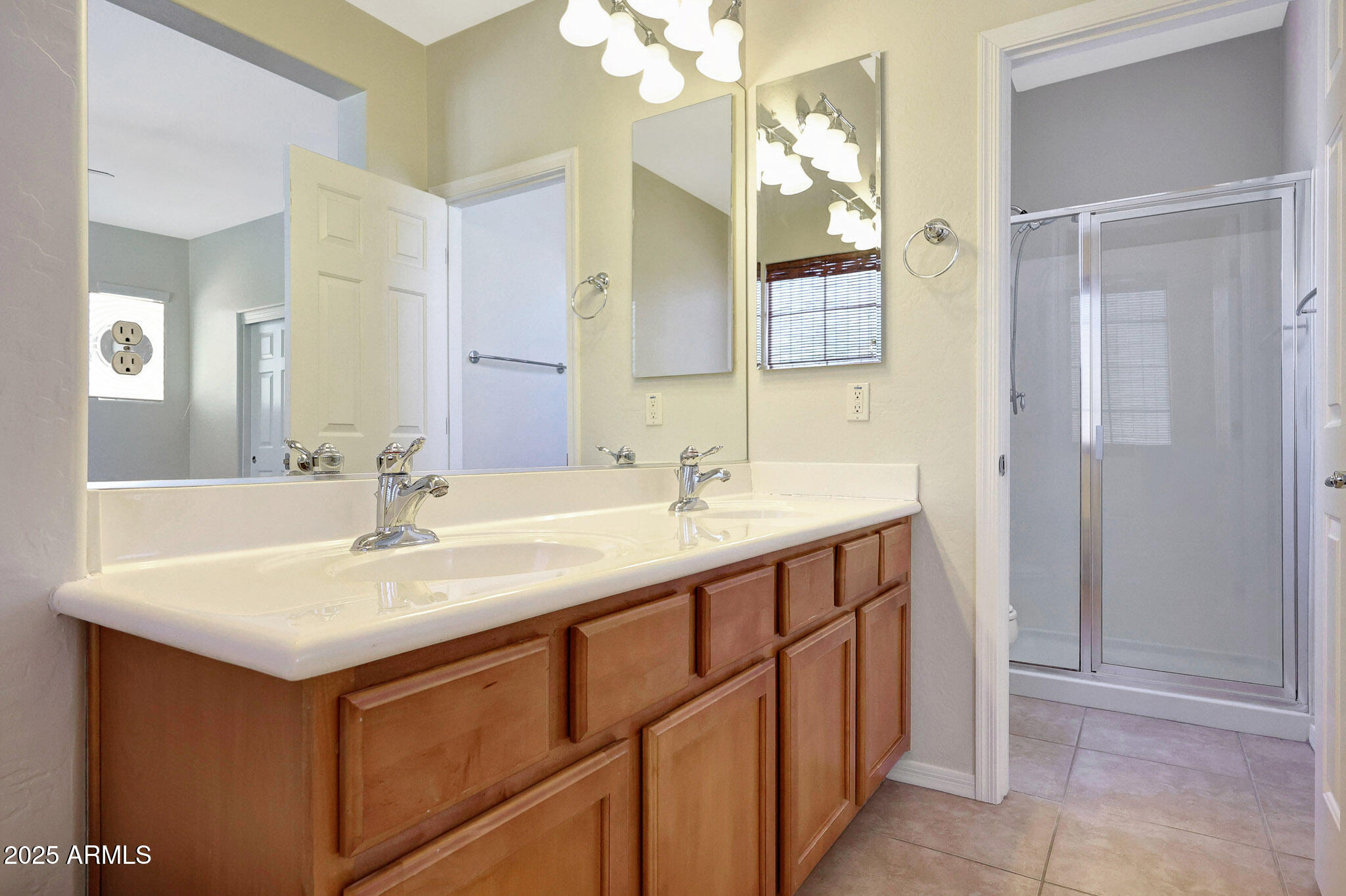 20822 West Ridge Road Buckeye, AZ 85396 - Photo 25 of 46 a bathroom with a sink and a mirror