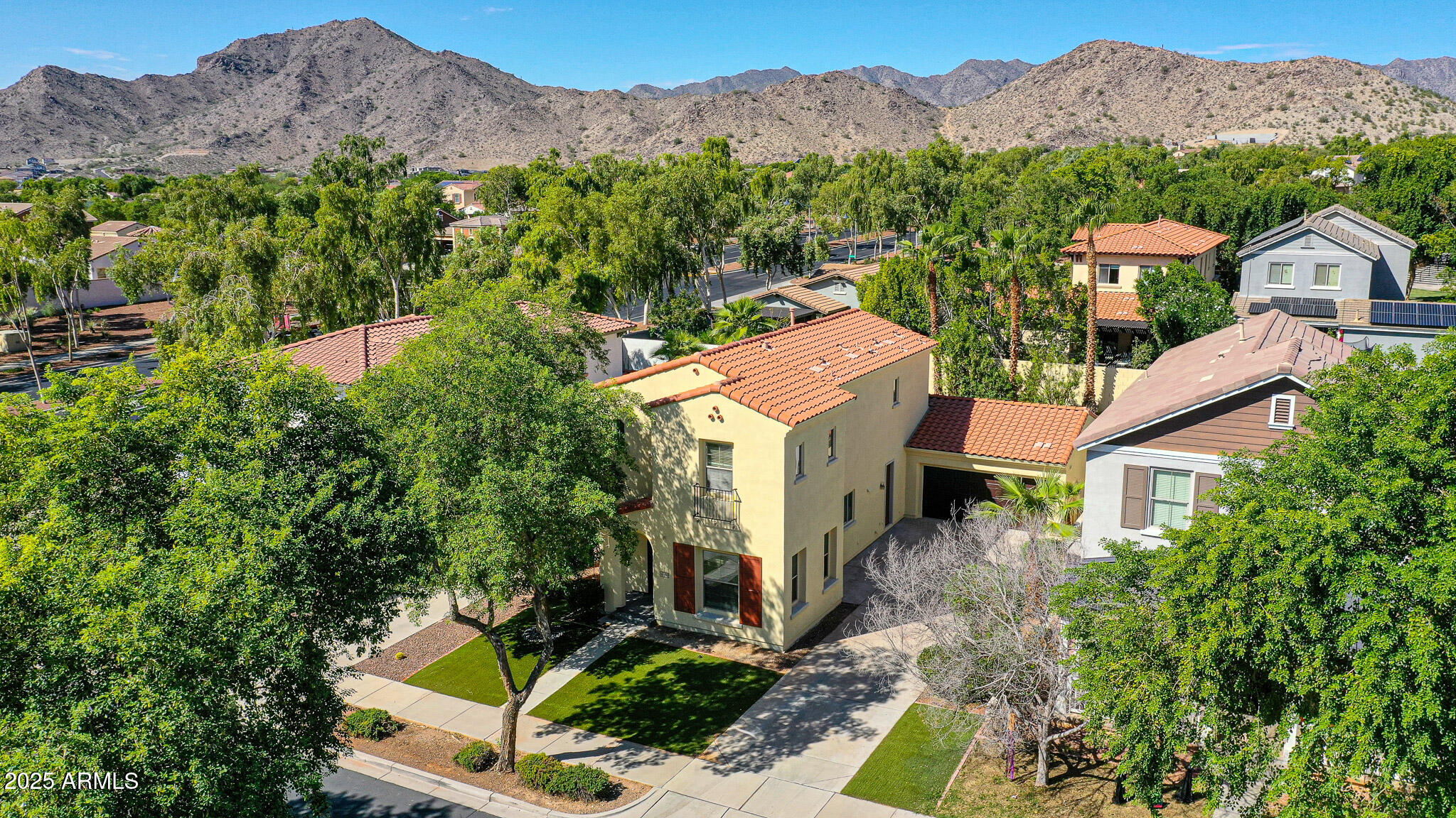 20822 West Ridge Road Buckeye, AZ 85396 - Photo 4 of 46 an aerial view of a house with a mountain