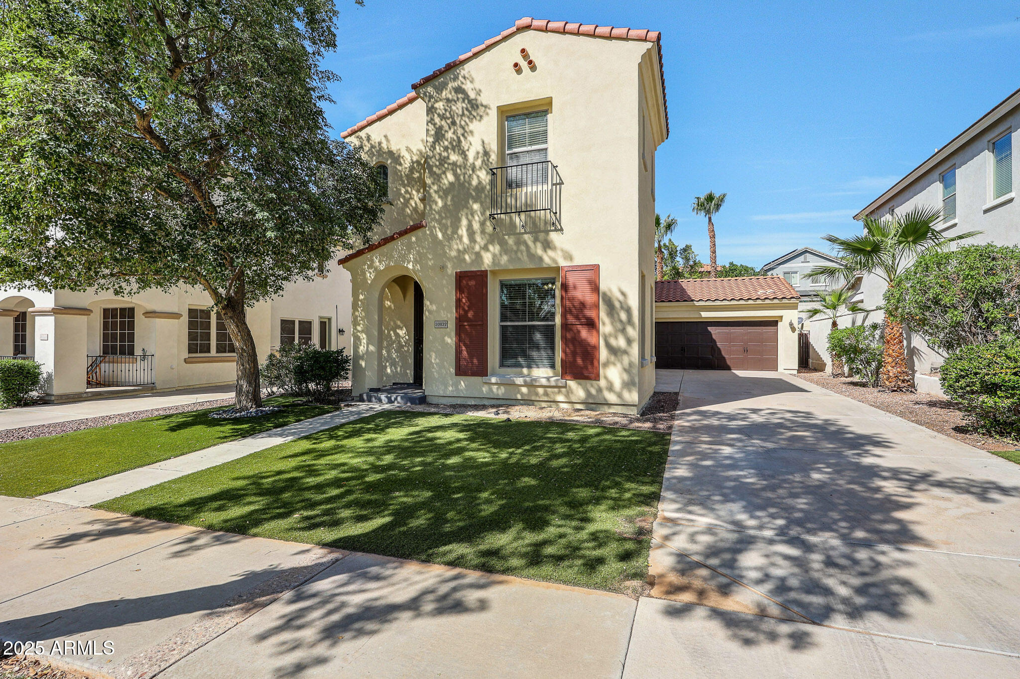 20822 West Ridge Road Buckeye, AZ 85396 - Photo 7 of 46 a front view of a house with garden