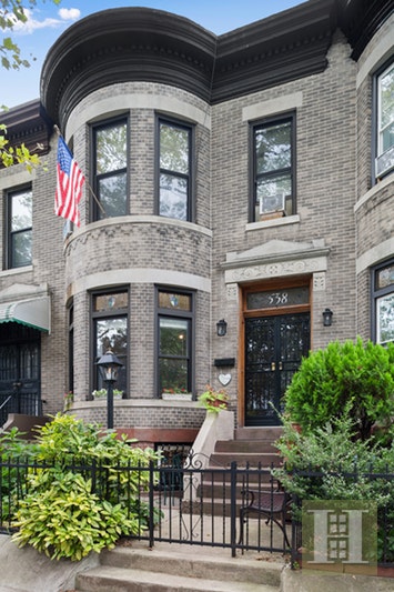 538 76th Street Brooklyn, NY 11209 - Photo 1 of 1 a front view of a house with garden