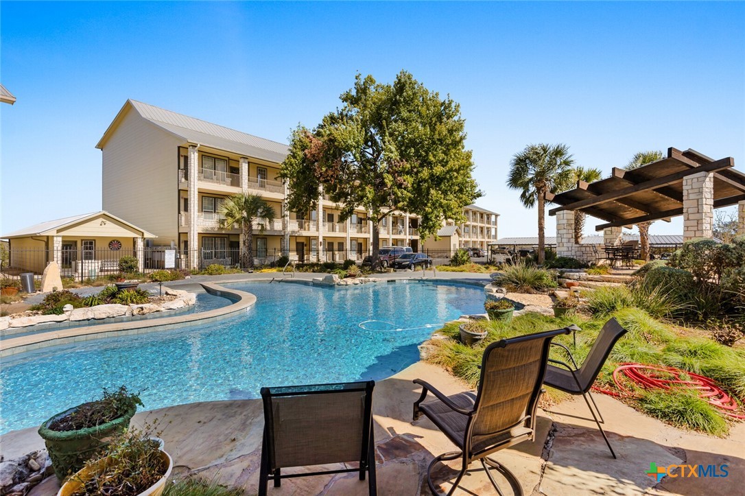 130 Sobrante Road, Unit 112 Belton, TX 76513 - Photo 1 of 48 a view of a backyard with sitting area