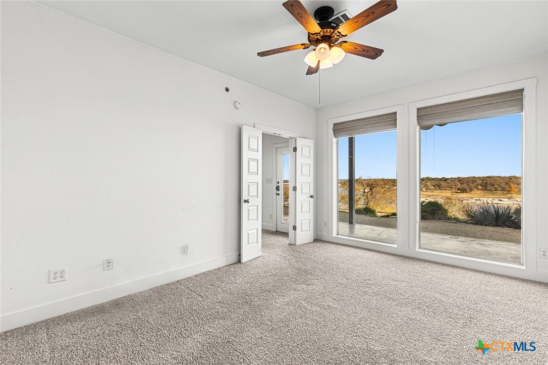 130 Sobrante Road, Unit 112 Belton, TX 76513 - Photo 17 of 48 a view of a livingroom with a ceiling fan and window