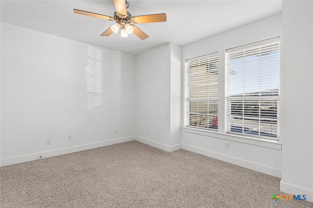 130 Sobrante Road, Unit 112 Belton, TX 76513 - Photo 24 of 48 a view of an empty room with a window