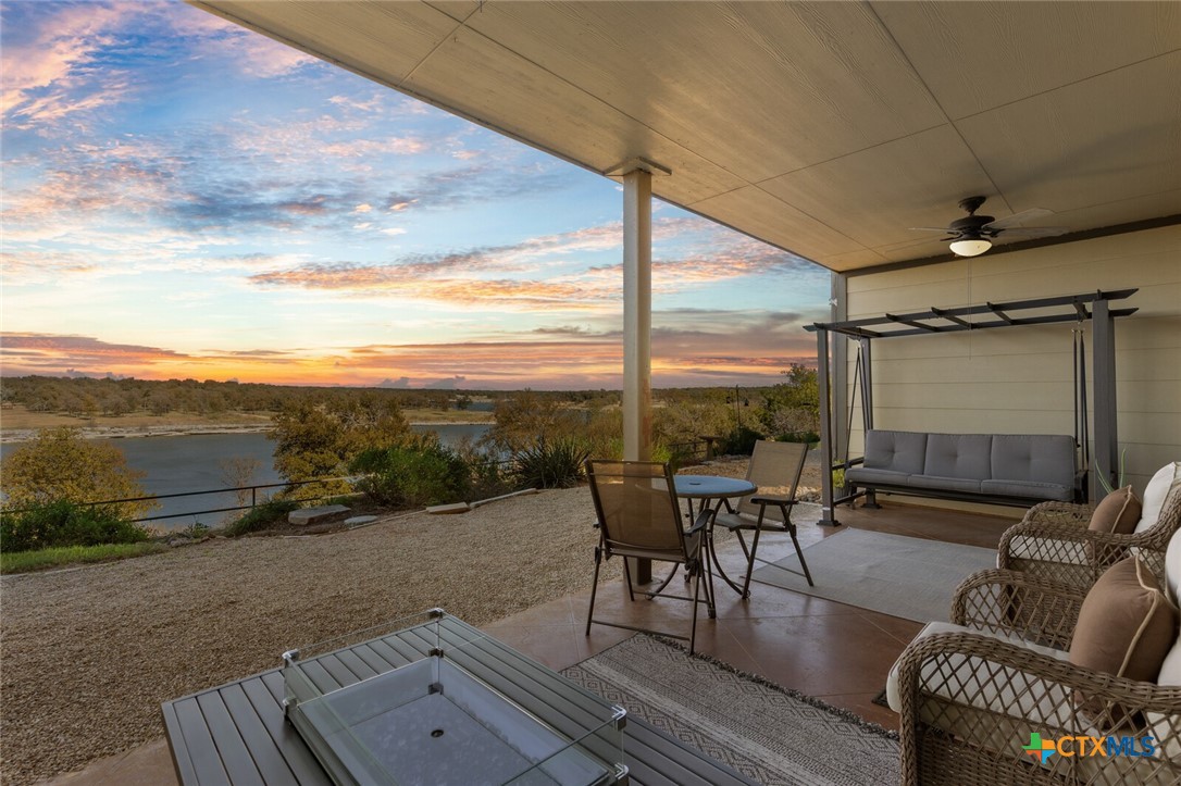 130 Sobrante Road, Unit 112 Belton, TX 76513 - Photo 32 of 48 a roof deck with couch and chairs
