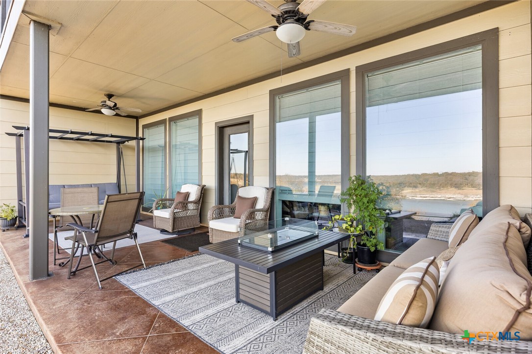 130 Sobrante Road, Unit 112 Belton, TX 76513 - Photo 36 of 48 a living room with furniture and a large window