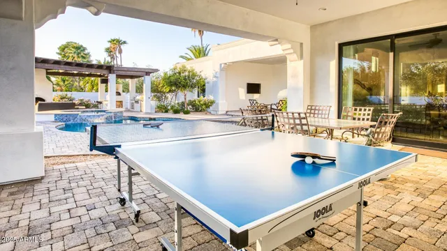 a room with table and chairs