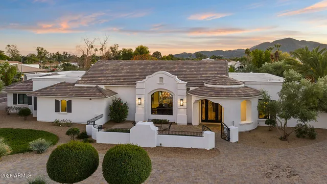 a view of a house with a garden
