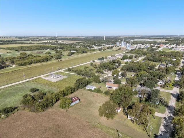 an aerial view of beach and ocean
