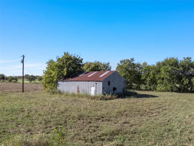 a house view with a garden space