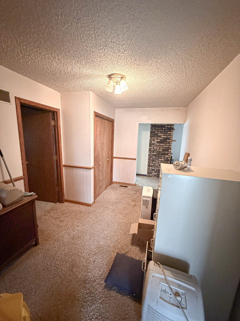 1599 East 2700 North Road Clifton, IL 60927 - Photo 18 of 26 a view of workspace with furniture and a window